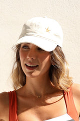 GORRA BLANCA ESTRELLA DORADA, GOGANA